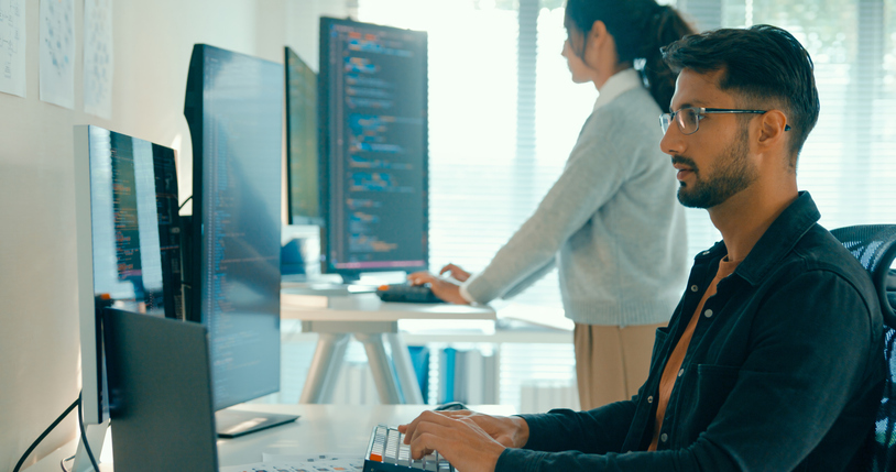 person at desk after having ergonomic assessment